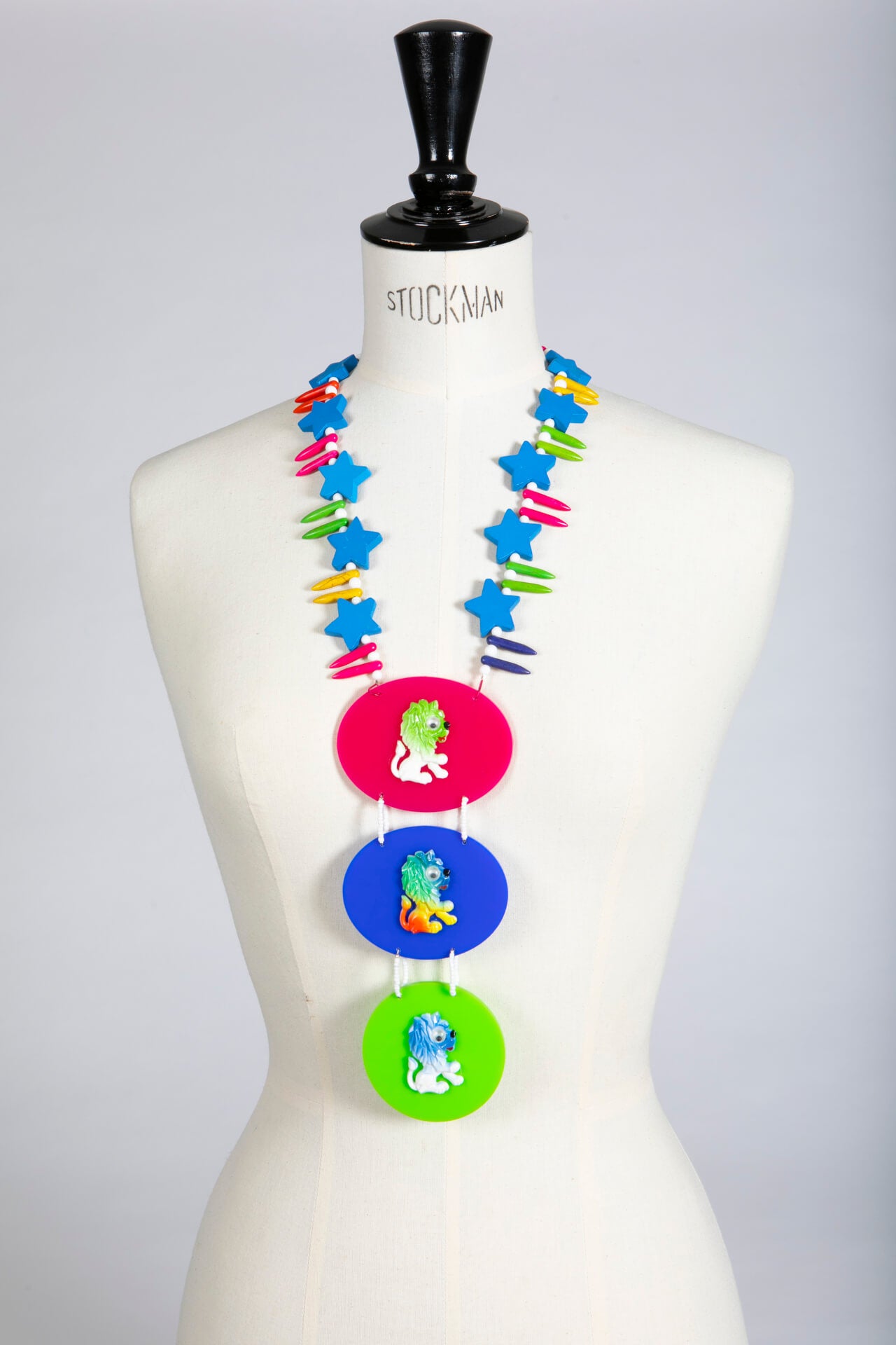 Vintage Plastic Lion Brooch Necklace on Blue Green and Pink Necklace