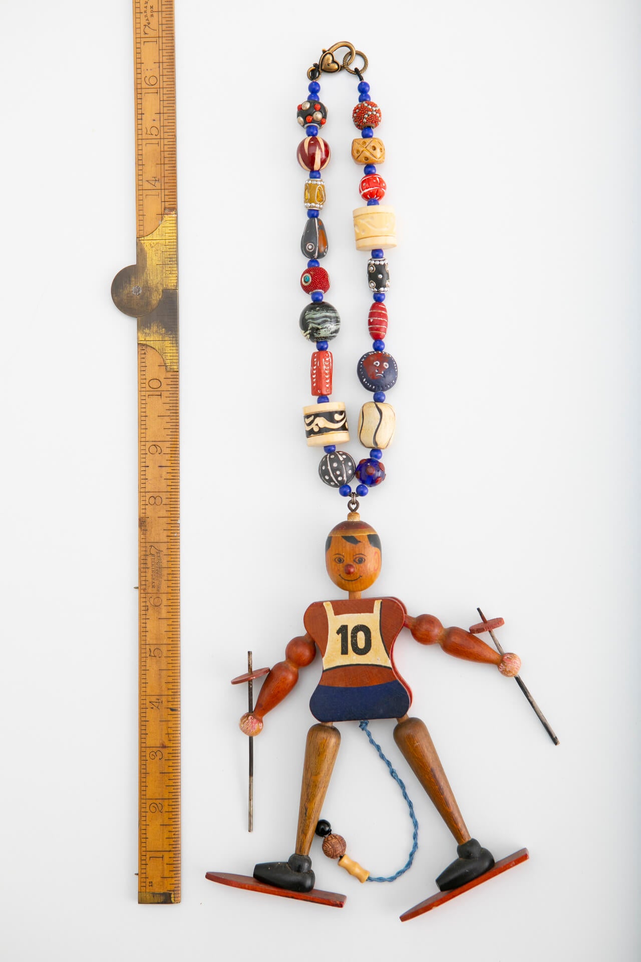 Vintage Skier Pull Toy on Chunky Bead Necklace