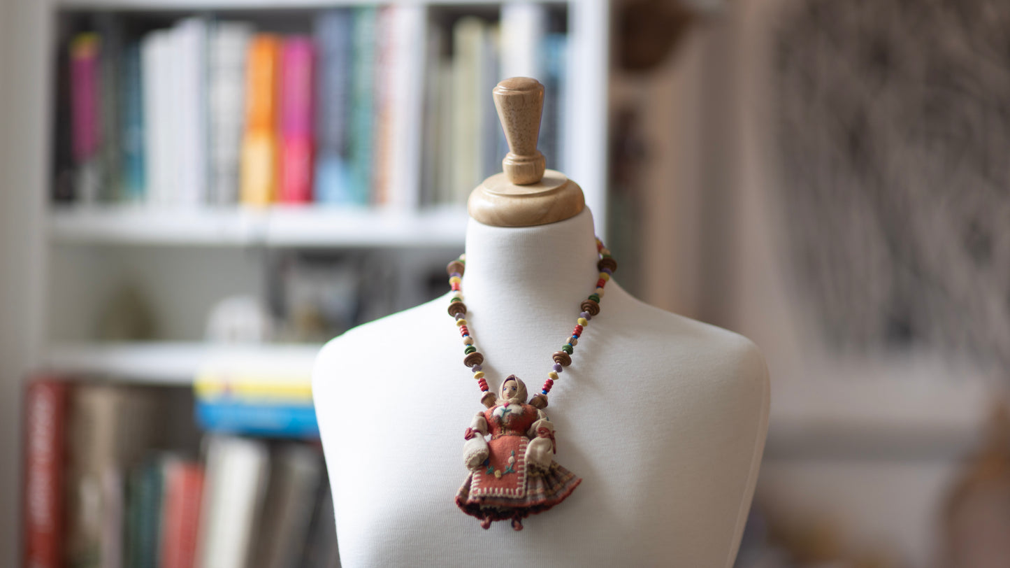 Fabric Folk Art Doll on Colourful Wood Necklace