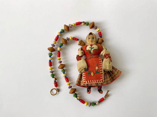 Folk Art Doll on Colourful Necklace