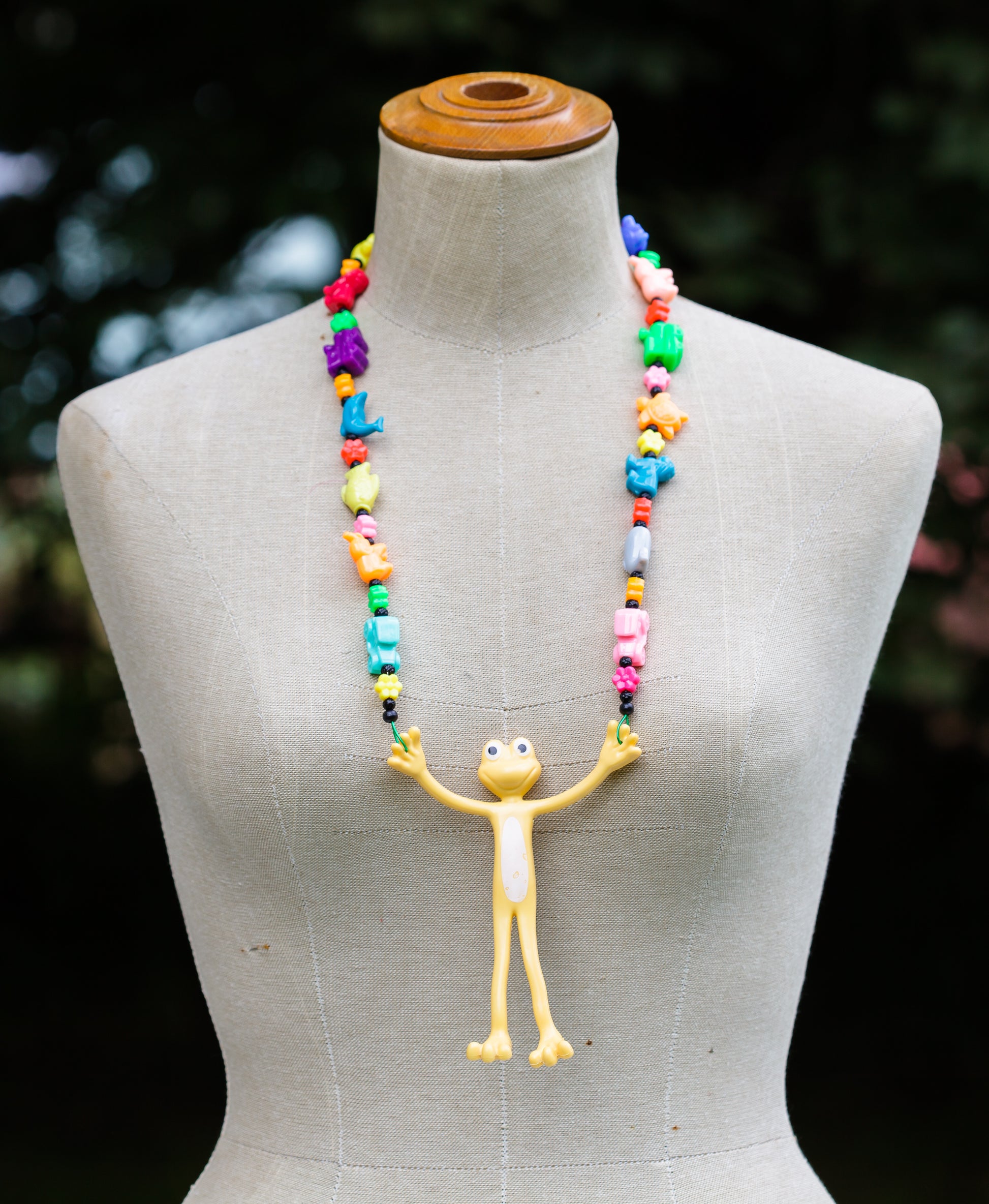Multicoloured Plastic Necklace with Bendy Frog Pendant