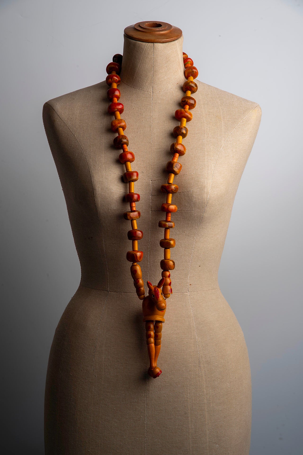 Old Toy Horse on Long Orange Necklace | Hopetown & Hunter