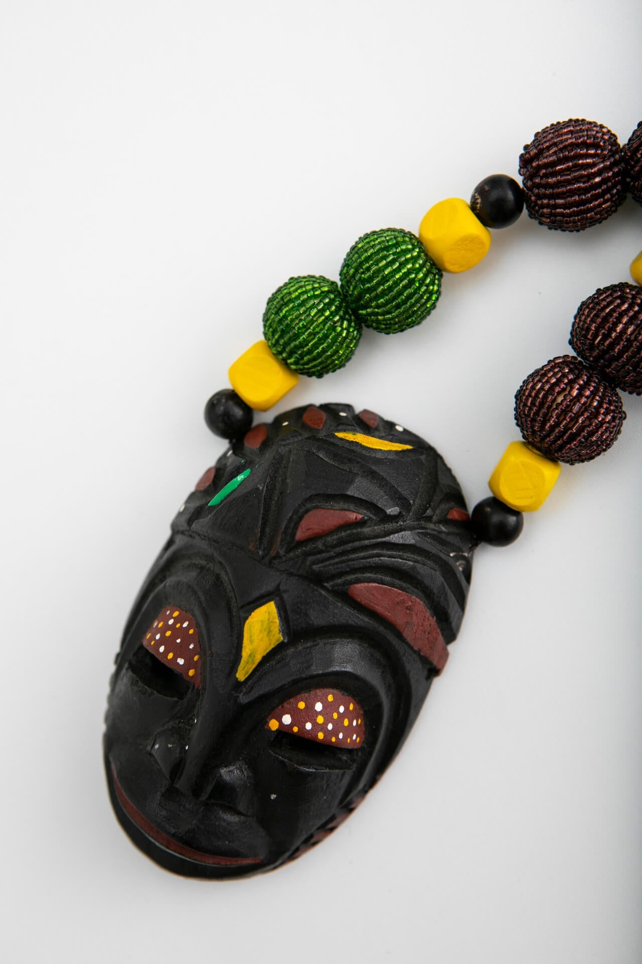 Short Wood Mask Necklace with Yellow, Green and Brown Beads | Hopetown & Hunter