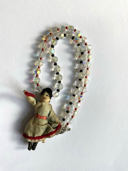 Tiny Waving Vintage Doll on Crystal Necklace