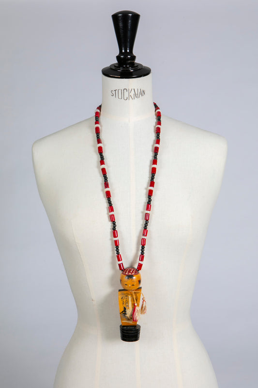 Vintage Kokeshi Doll on Long Coral Necklace