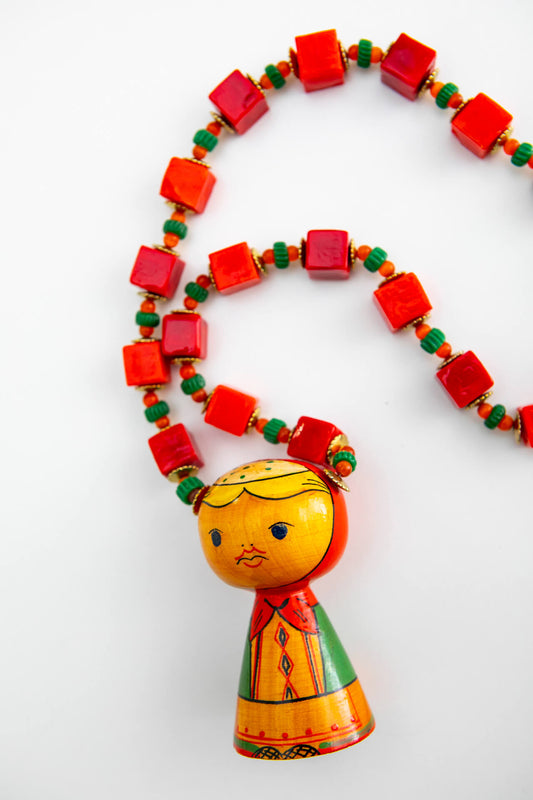 Wood Folk Art Doll on Long Red Necklace
